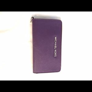 Purple Michael Kors wristlet/wallet